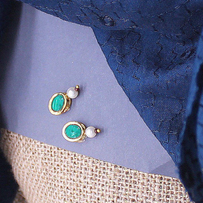 Oval shape stone decorated earrings for idols