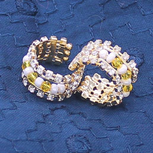 Yellow moti and stone decorated kangan/handcuff for idols