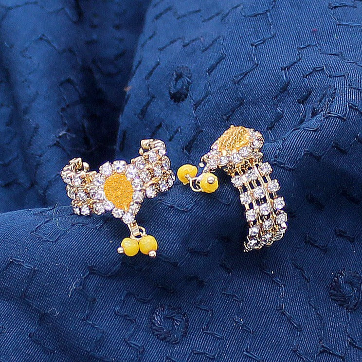 Yellow stone decorated with latkan kangan for Idols