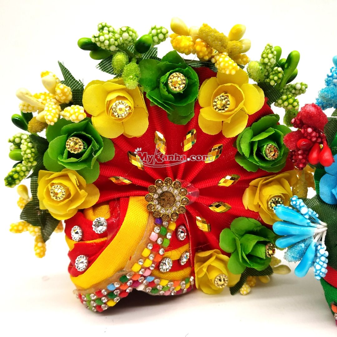 Heavy mukut decorated with Pollen and flower for laddu gopal is available in multiple size  and colors.