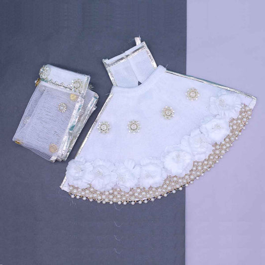 Stone and flowers decorated white dress for Mata Rani