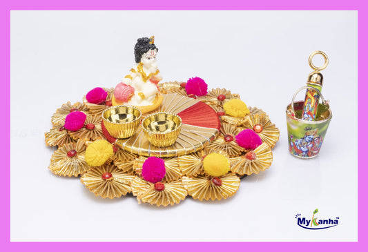 Laddu Gopal Decorated Puja Thali Platter with Bucket and Pichkari for Holi Celebration
